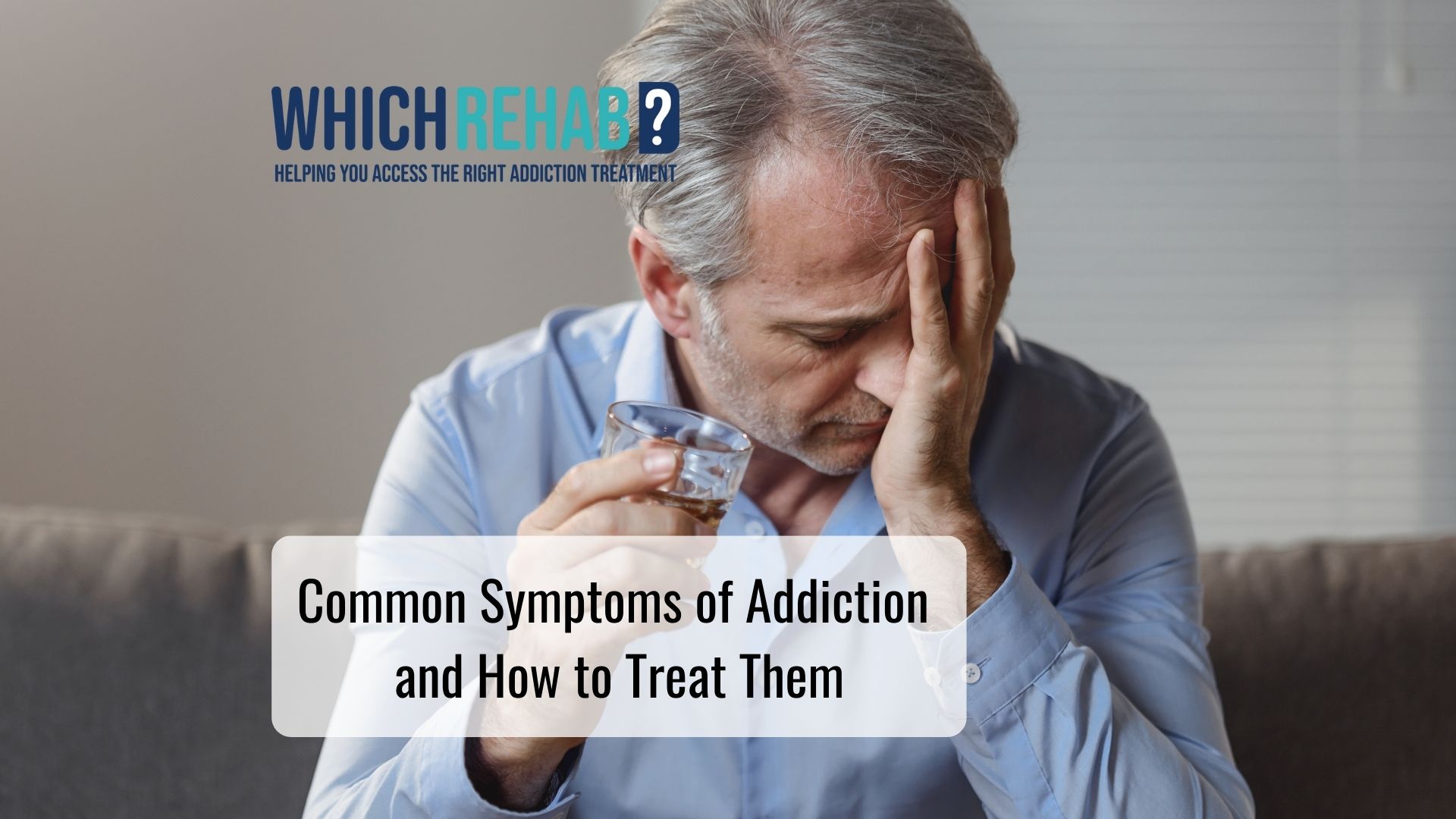 A man with his head in his hands holding a drink - Which Rehab