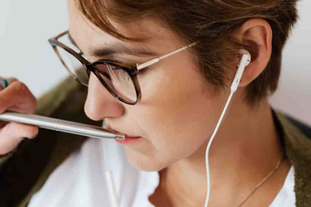 A woman thinking about REBT - Which Rehab